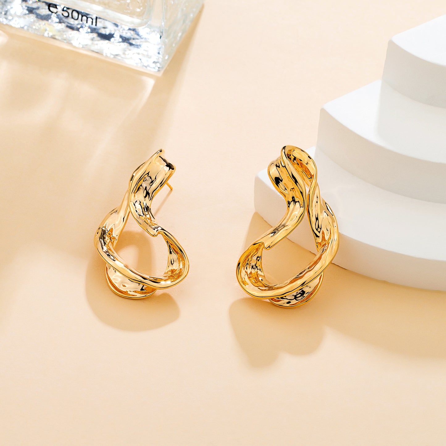 Boucles d'oreilles distordus