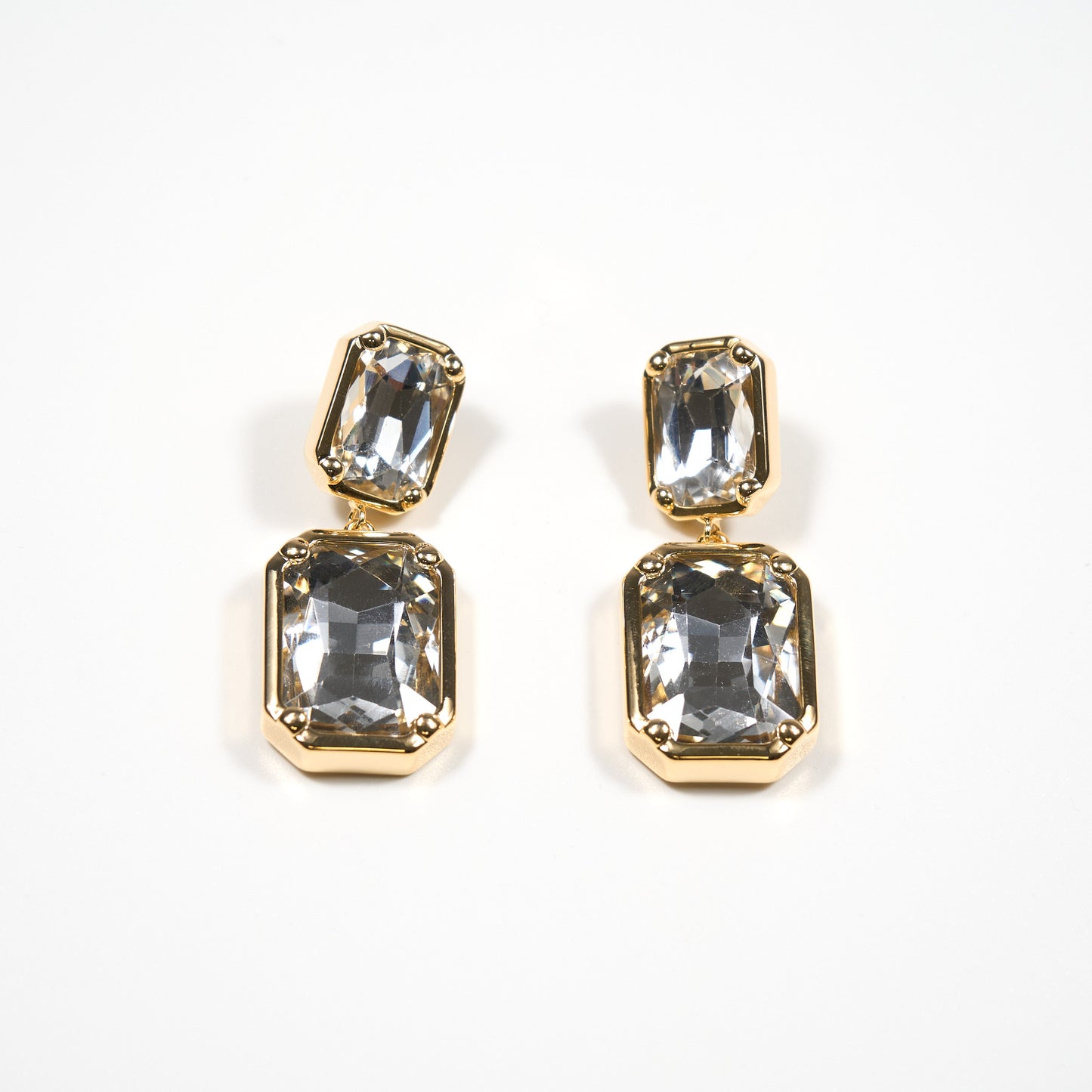 Boucles d'oreilles pendantes avec deux cristaux rectangulaires sertis