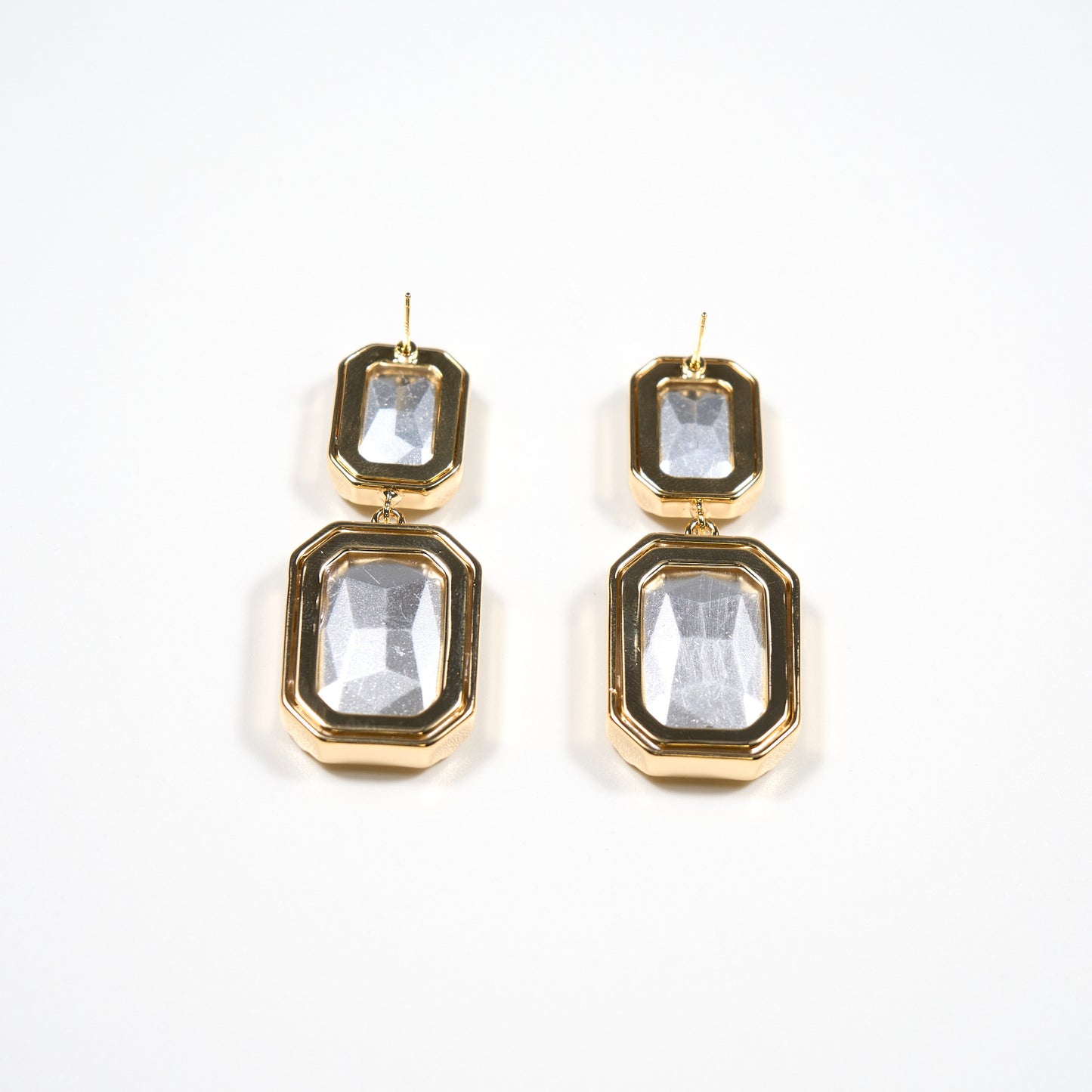 Boucles d'oreilles pendantes avec deux cristaux rectangulaires sertis