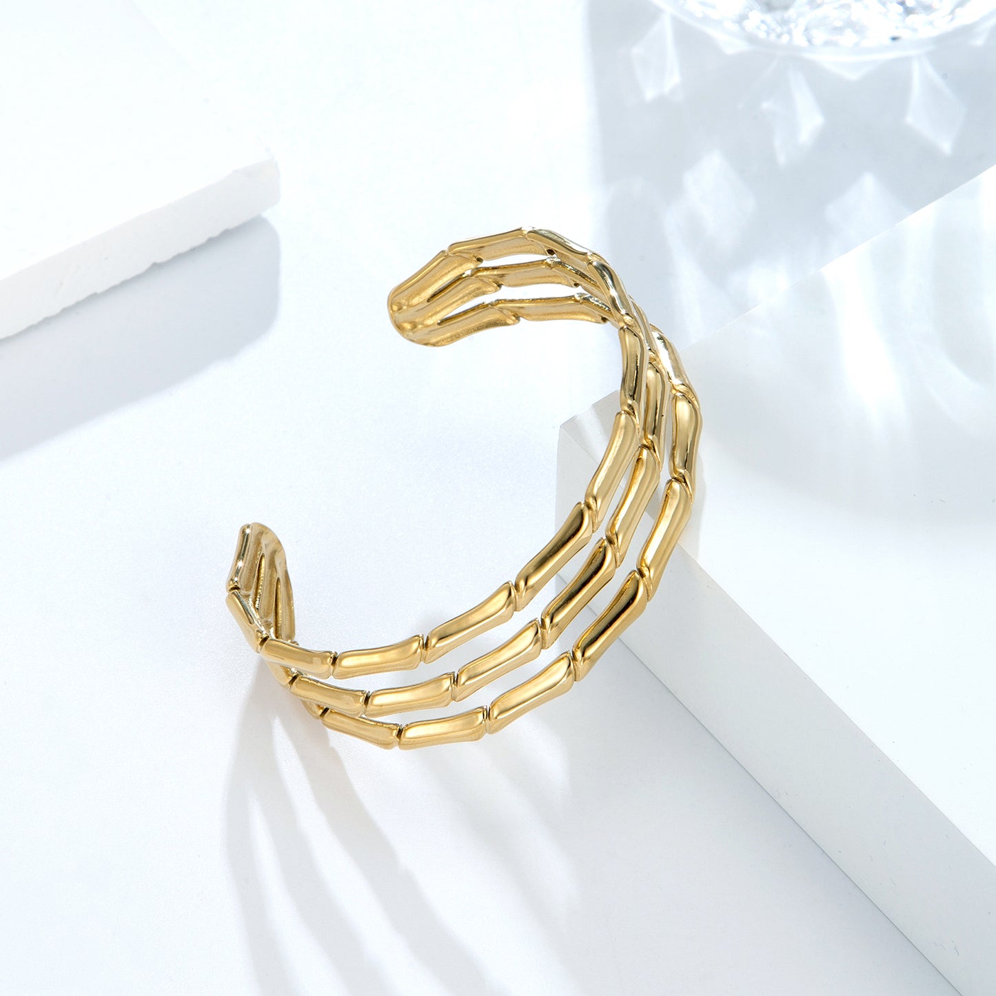Bracelet jonc triple doré aspect bambou