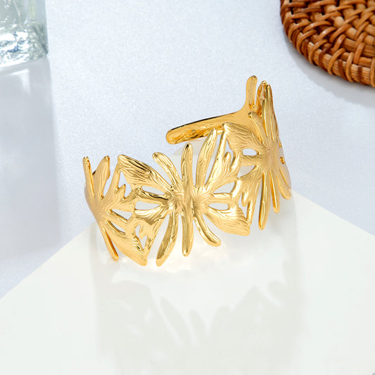 Bracelet jonc feuilles dorées ajourées