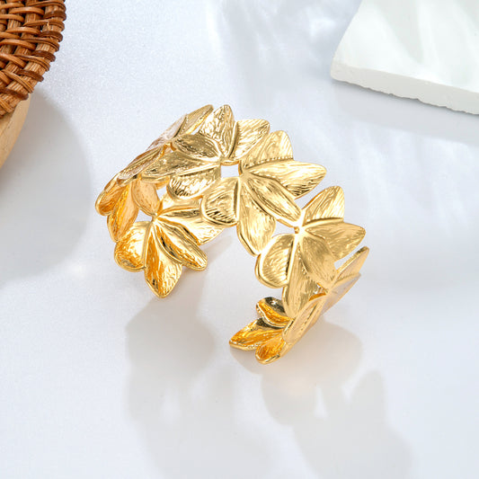 Bracelet jonc fleurs dorées ouvert
