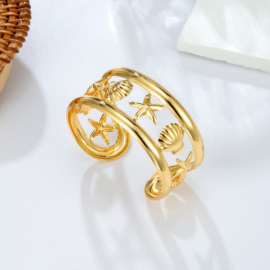 Bracelet jonc doré motifs marins