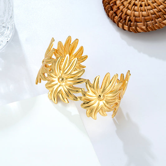 Bracelet jonc fleurs dorées tropicales