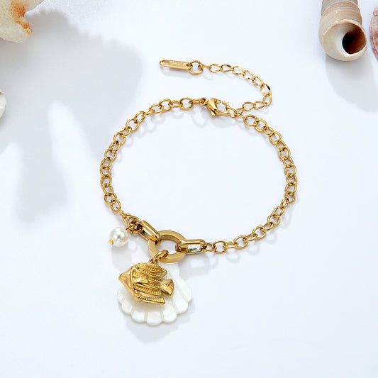 Bracelet chaîne dorée perles blanches