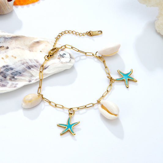 Bracelet coquillages étoiles bleues dorées