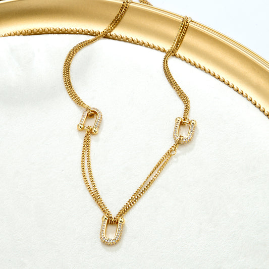 Collier chaînes dorées maillons diamantés