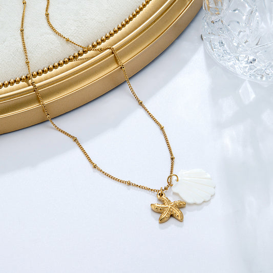Collier étoile mer coquillage doré