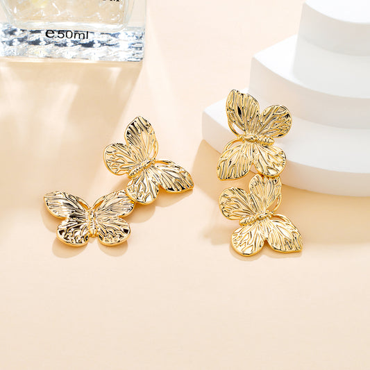 Boucles d’oreilles pendantes dorées