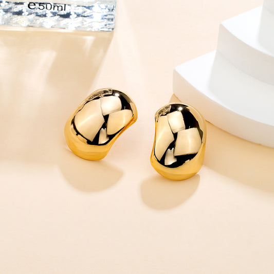 Boucles d’oreilles torsadées dorées