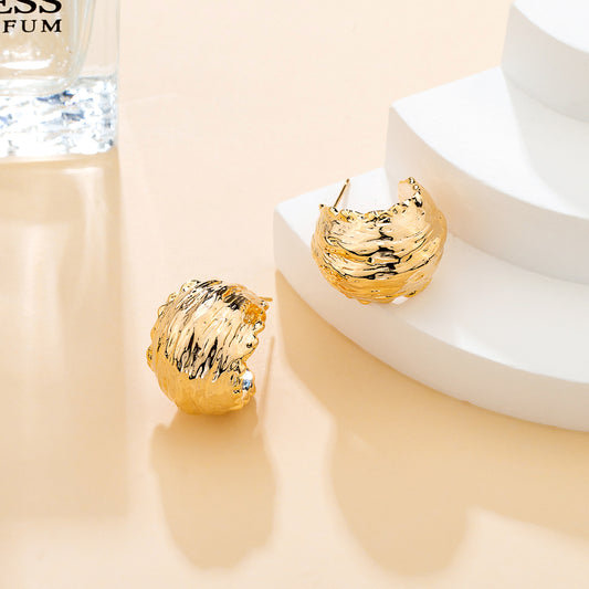 Boucles d’oreilles minimalistes dorées