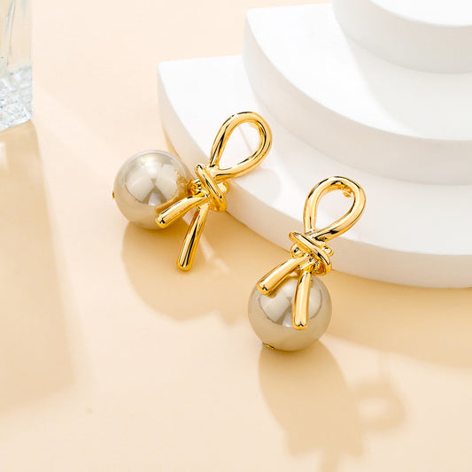 Puces d’oreilles dorées