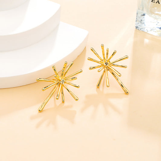 Boucles d’oreilles étoile dorée