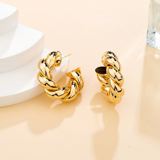 Boucles d’oreilles torsadés dorées