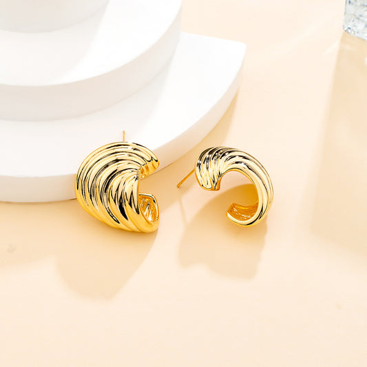 Puces d’oreilles dorées