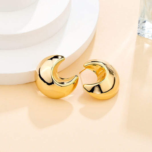 Boucles d’oreilles demi-lune dorée
