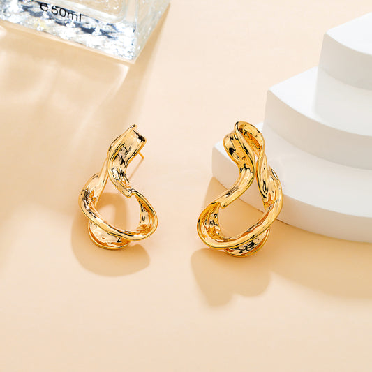 Boucles d'oreilles distordus