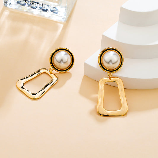 Puces d'oreilles perle ivoire