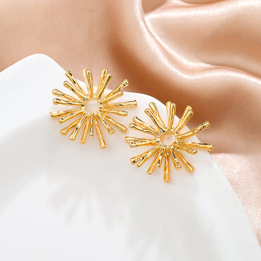 Boucles d’oreilles rayons dorés