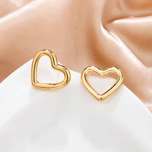 Boucles d’oreilles dorées en coeur