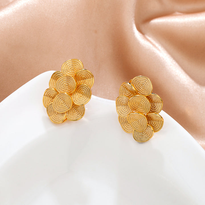 Boucles d'oreilles aurore dorée — bijou statement femme Influence Réunion