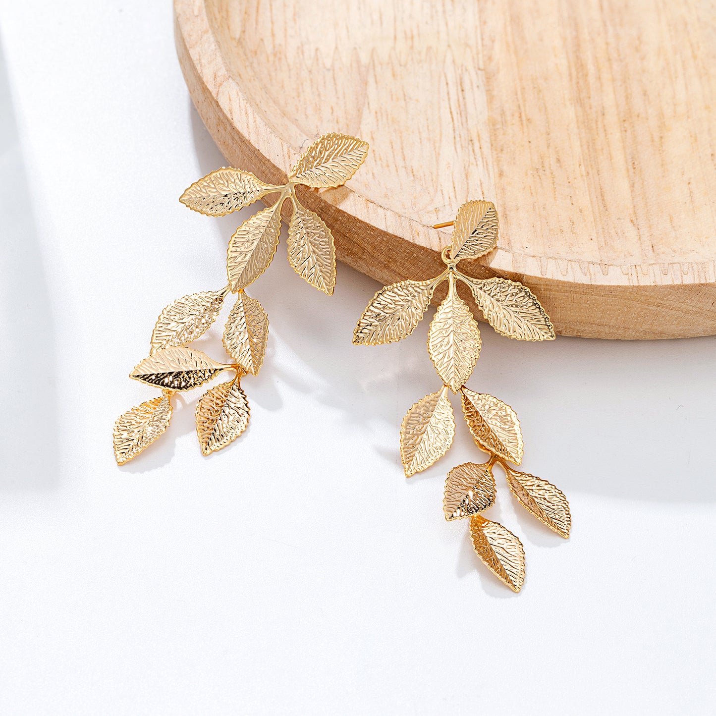 Boucles d'oreilles feuilles dorées pendantes