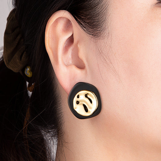 Boucles d'oreilles dorées effet froissé