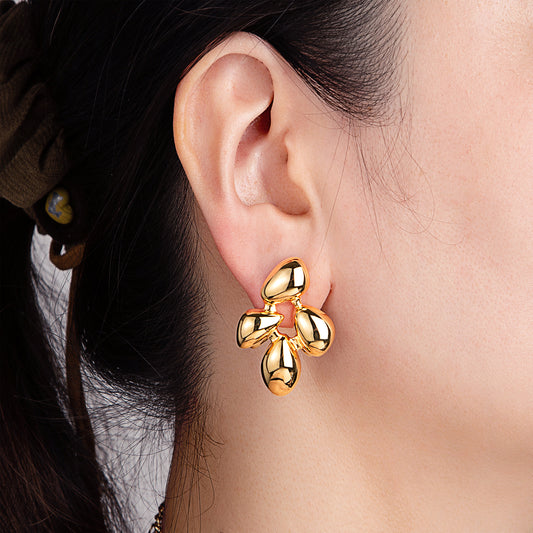 Boucles d'oreilles fleur dorée