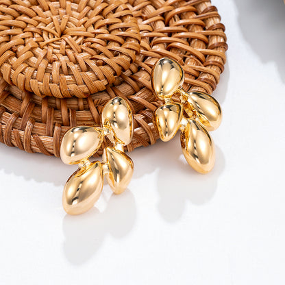 Boucles d'oreilles fleur dorée