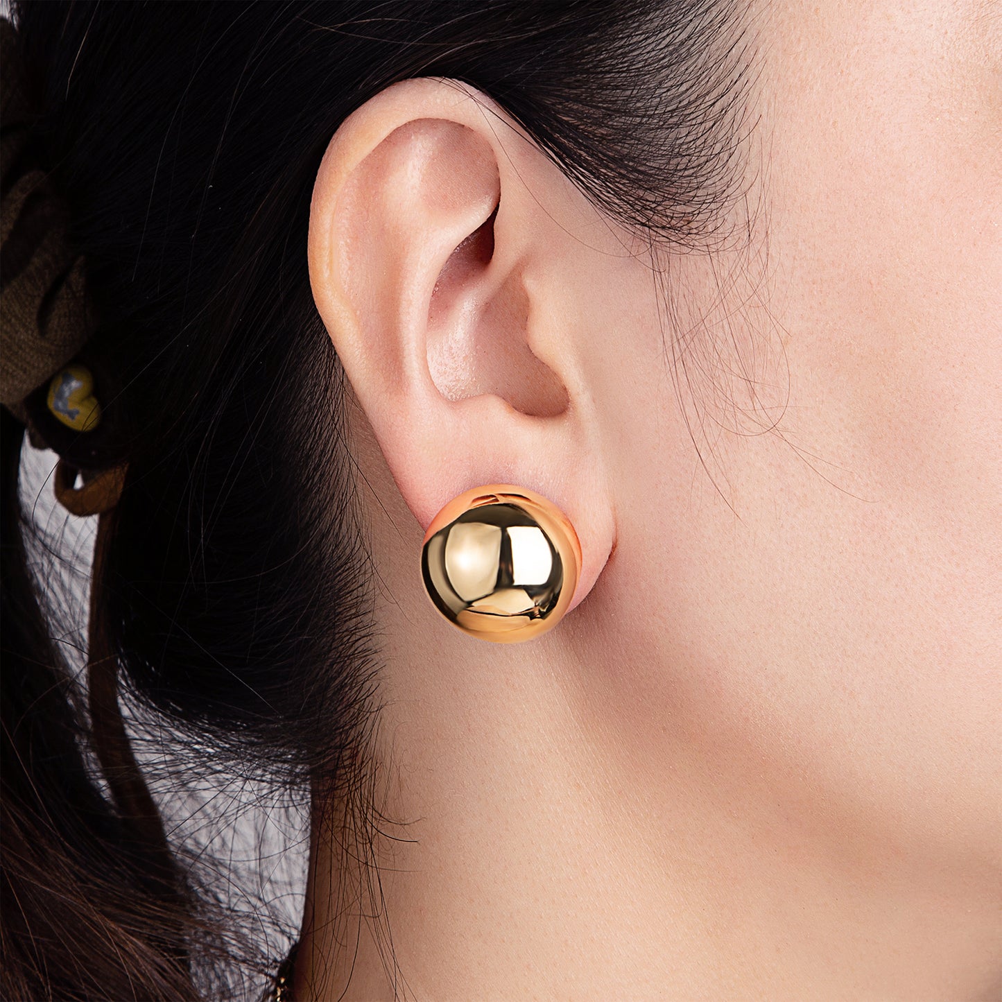 Boucles d'oreilles dorées sphère
