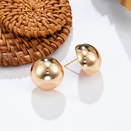 Boucles d'oreilles dorées sphère