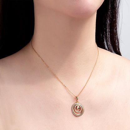 Collier pendentif cercles dorés diamantés