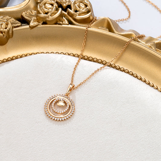 Collier pendentif cercles dorés diamantés
