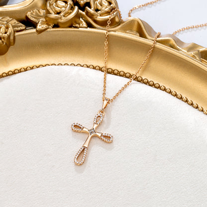 Collier croix dorée strass brillants