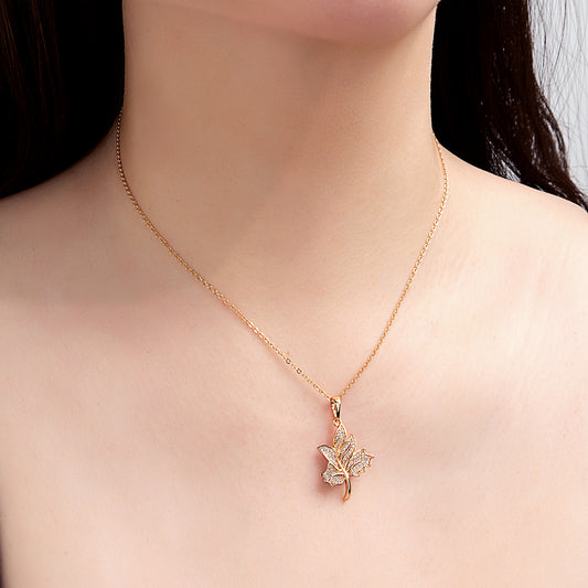 Collier pendentif feuille dorée cristaux