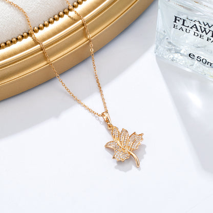 Collier pendentif feuille dorée cristaux