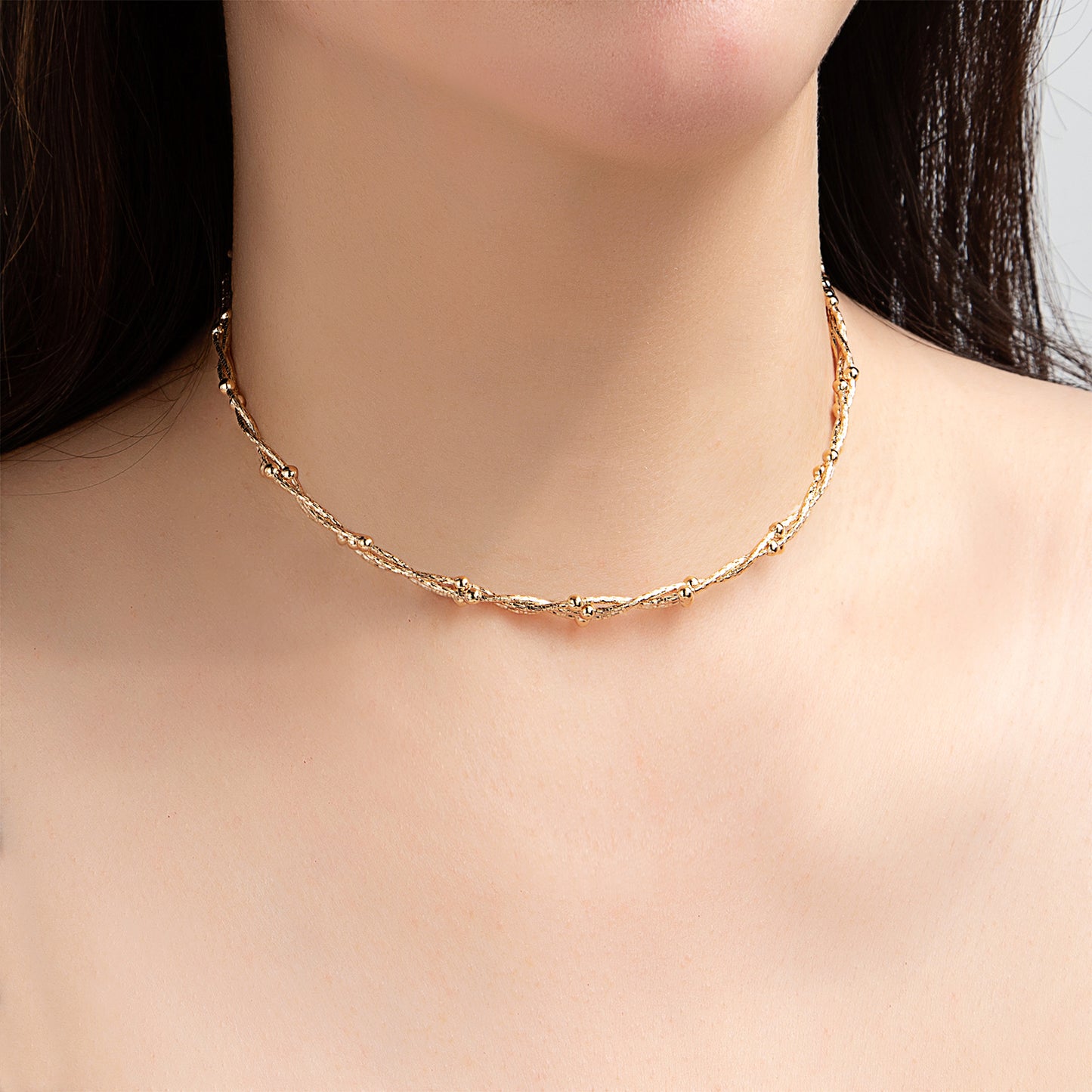 Collier chaîne torsadée dorée fine