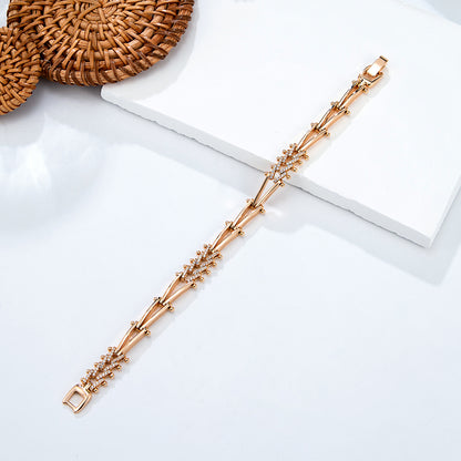 Bracelet doré motifs géométriques cristaux