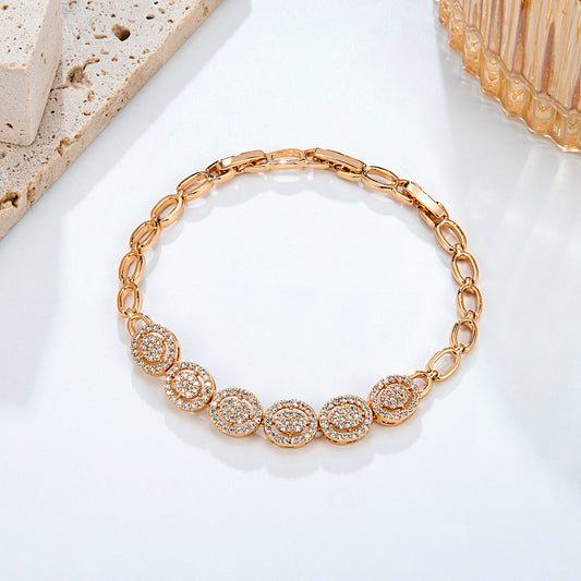Bracelet chaîne médaillons cristaux dorés