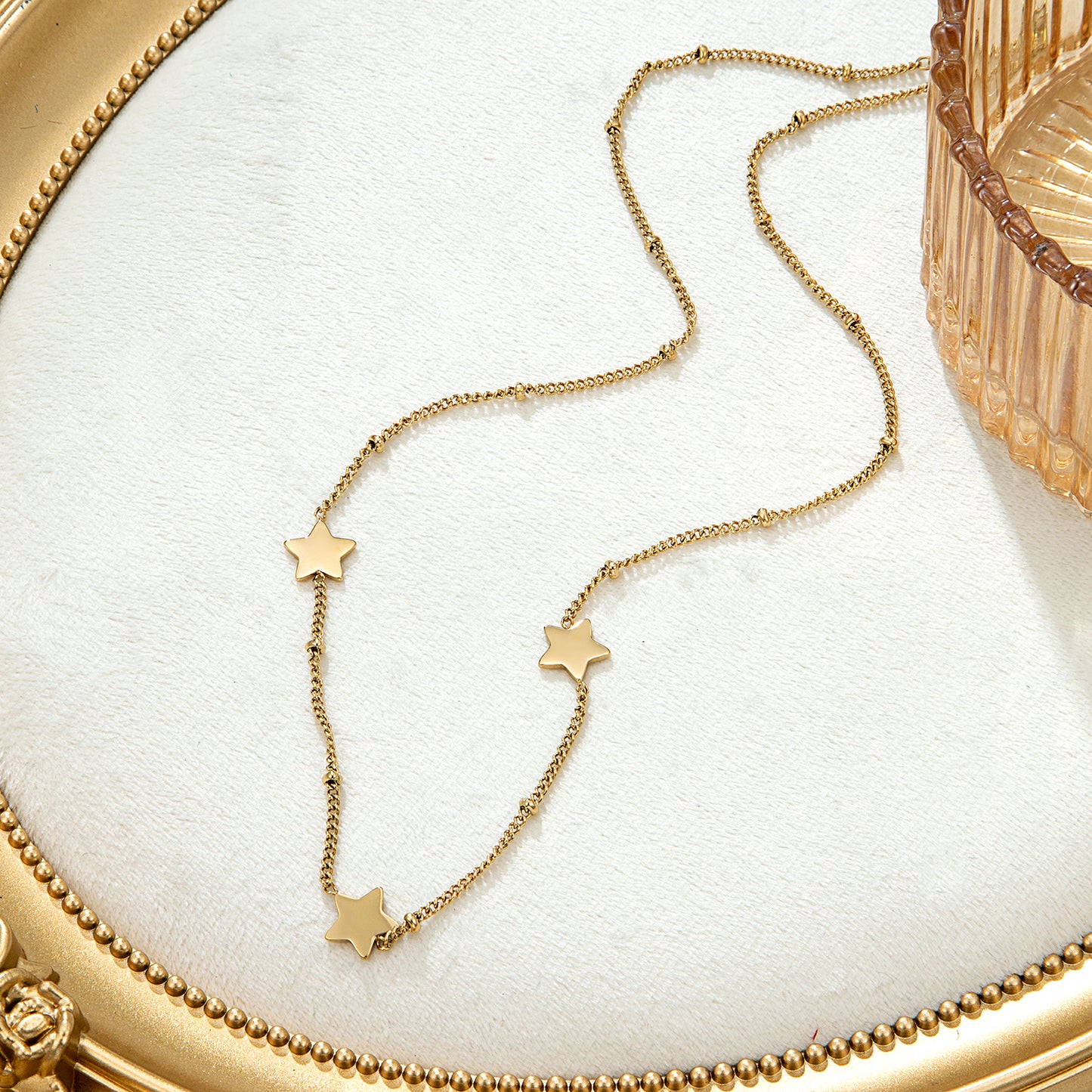 Collier doré étoiles fines chaîne